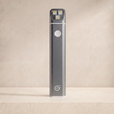 ClearLip Cold Sore Wand sleek grey handheld light therapy device displayed upright on a neutral surface.
